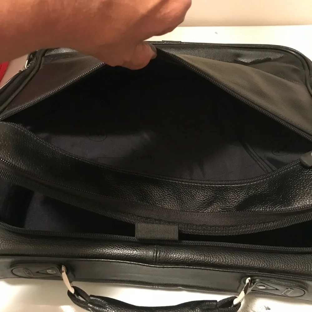 Dell laptop and office briefcase 💼